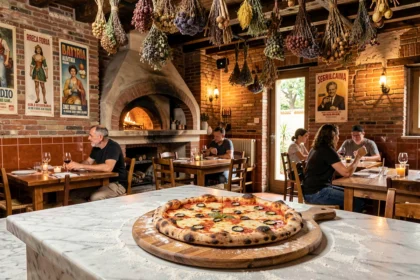 Intérieur chaleureux d'une pizzeria artisanale en Occitanie avec four à bois et pizza napolitaine sur planche en bois